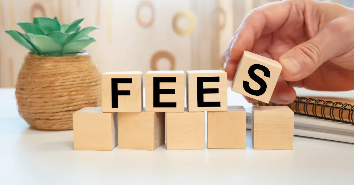 wood blocks spelling word FEES