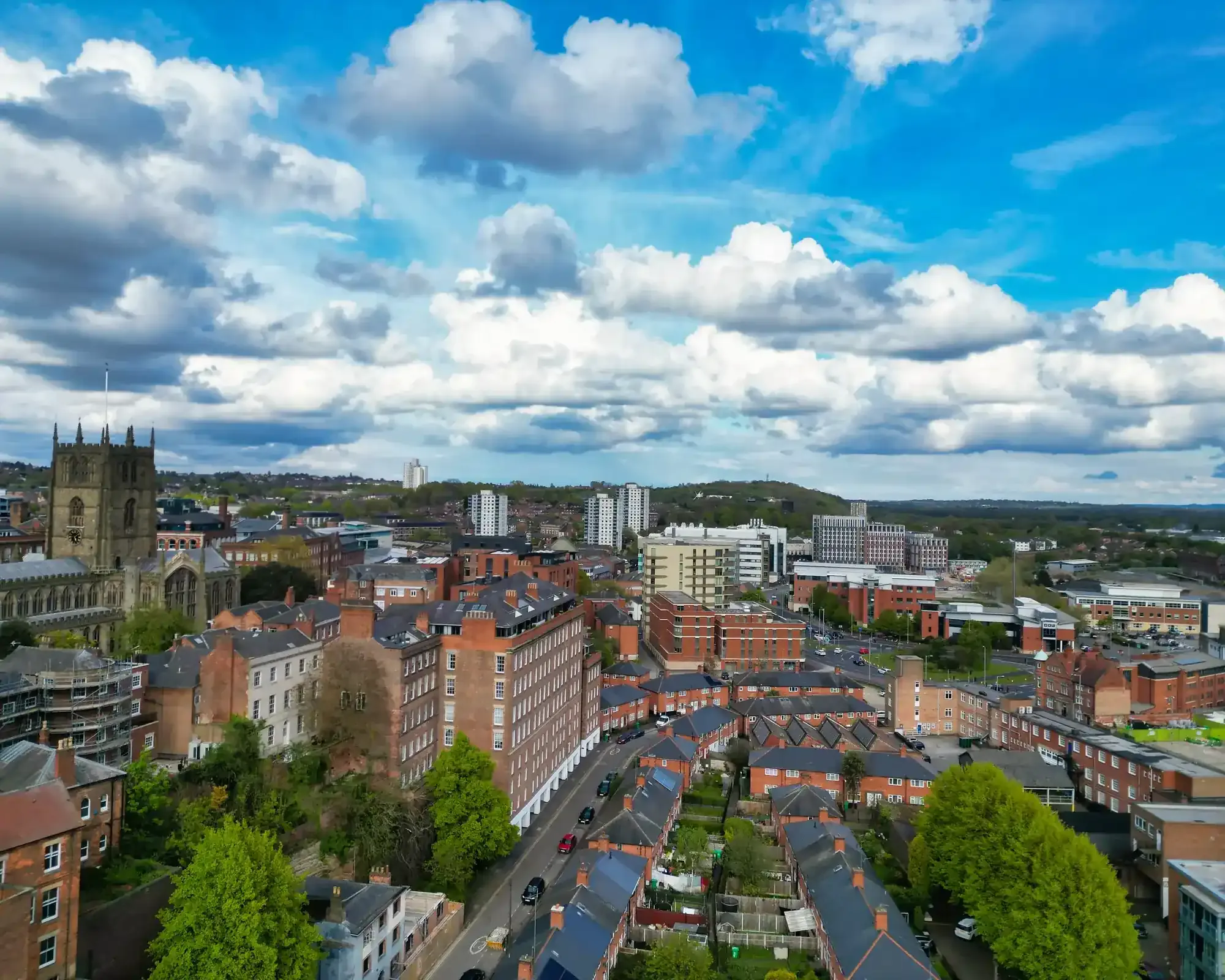 Aerial view of Northampton town centre, featuring All Saints' Church and residential streets