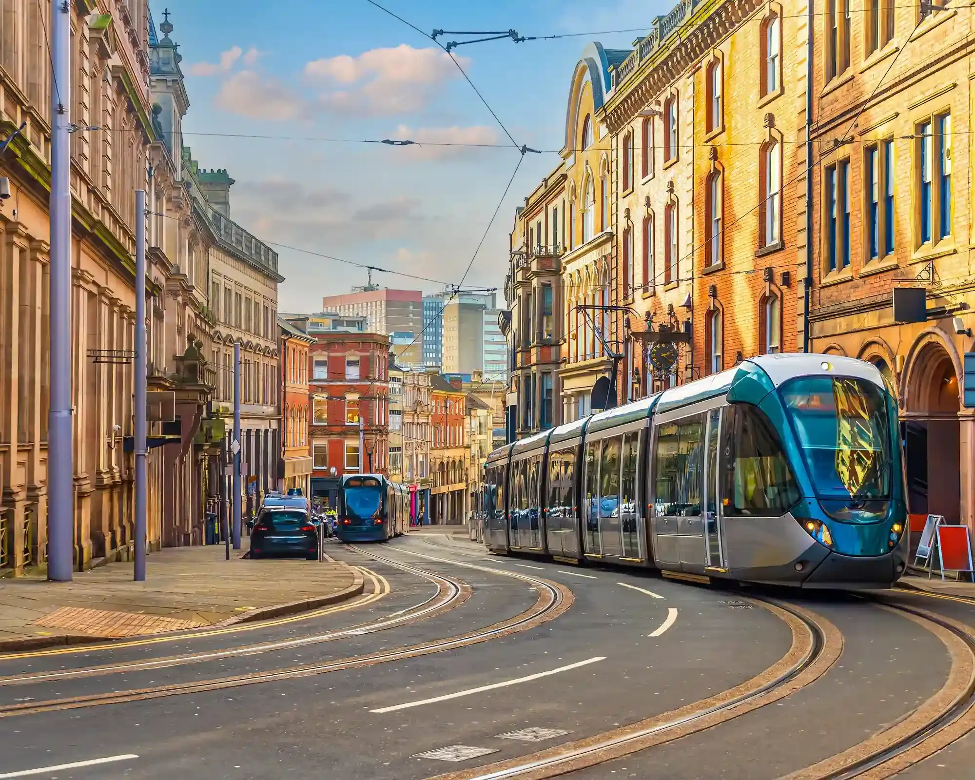 A Nottingham Express Transit tram on a city centre street, home to our conveyancing solicitors